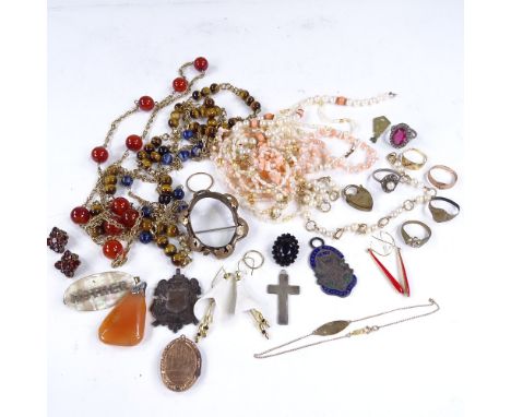 A box of various jewellery, including 9ct gold buckle ring, yellow metal bead necklaces, silver cross etcLot sold as seen unl