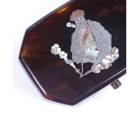 A small 19th century tortoiseshell tobacco box, mother-of-pearl and silver inlaid lid, depicting a Turkish man smoking a pipe