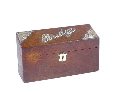 An Edwardian oak and silver-mounted Bridge playing card box, with sloping lid, hallmarks for Levi & Salaman, Birmingham 1905,