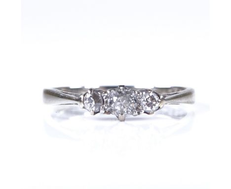 An 18ct white gold 3-stone diamond ring, total diamond content approx 0.2ct, setting height 3.7mm, size K, 1.7gVery good over