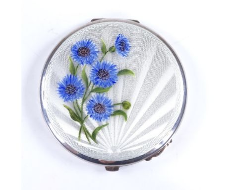 An Elizabeth II silver and enamel circular compact, engine turned sunburst decoration with hand painted flowers, maker's mark