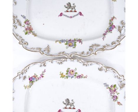A pair of Chamberlain's Worcester armorial platters in gilded floral decorated surrounds, 31cm acrossSeveral light glaze mark