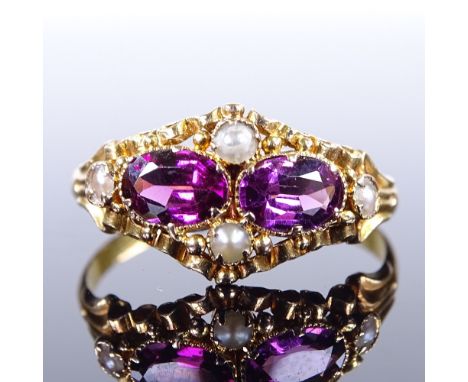 A 19th century 15ct gold garnet and split pearl dress ring, hallmarks Birmingham 1865, setting height 9.4mm, size O, 1.7gVery