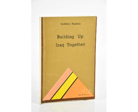 HUSSEIN (SADDAM), BUILDING UP IRAQUE TOGETHER, first edition, signed to the frontis portrait plate, Dar al-Ma’mun, 1983 (1)Co