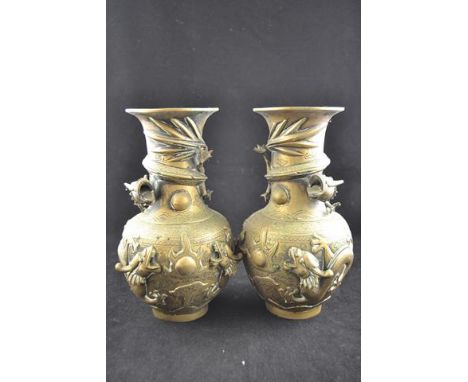 A  pair of Chinese brass bulbous vases with dragons in relief chasing flaming pearl, mark to base - H26cmCONDITION REPORTdrag