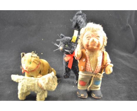 A Steiff black cat - H22cm, a vintage hedgehog, together with two cats