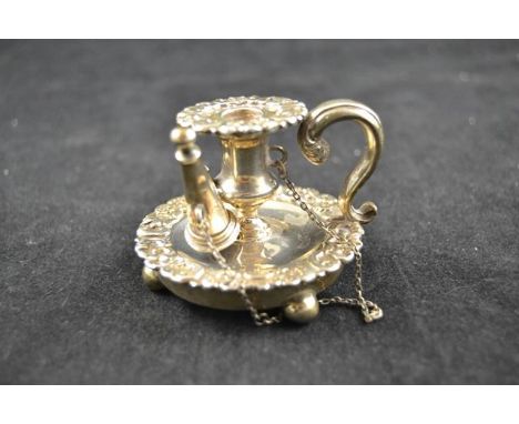 A late Georgian miniature candlestick, foliate border, complete with snuffer, London 1836, maker Charles Gordon - diameter 6c