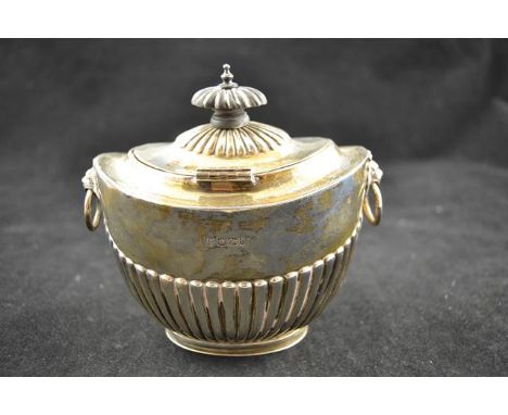 A Georgian style half fluted tea caddy of oval form, maker Sheffield 1901, James Deakin & Sons - approx weight 185.6g/5.9 tro