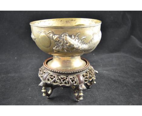 A Chinese Zeesung Silver white metal bowl embossed with a dragon chasing the flaming pearl - diam 15.5cm - approx weight 298g