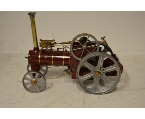 A 1.5" scale live steam traction engine in maroon livery - L60cm, W24cm