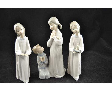 Three Lladro porcelain figures - girl holding chamber stick, H20cm; similar figure missing chamber stick, H20cm; girl and boy