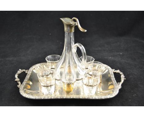 A silver plated liqueur set comprising lobed liqueur decanter, six glasses and two handled tray, maker L&WS - L23cmCONDITION 