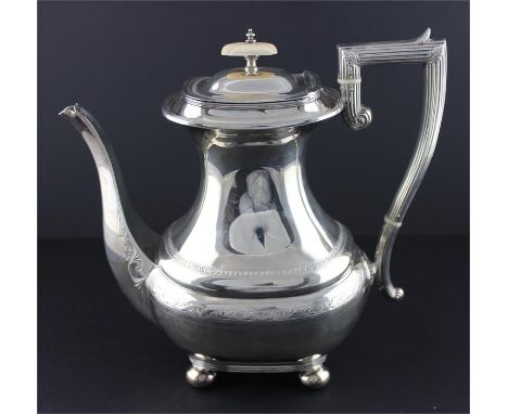 A large Victorian silver coffee pot, by Henry Wigfull, Sheffield 1885, of bulbous and rounded rectangular form, with part bri