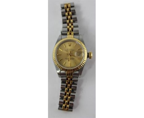 A stainless steel and yellow gold ladies' Rolex Oyster Perpetual Datejust chronometer bracelet watch, gold dial with applied 