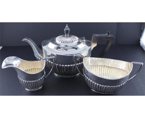 A Victorian three piece silver tea set, by Walter &amp; John Barnard, London 1891, comprising tea pot, milk jug and sugar, al