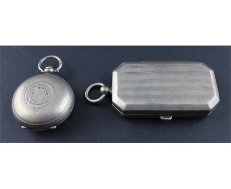 A silver sovereign case, by Selfridge &amp; Co Ltd, assayed Birmingham 1912, of rectangular form with chamfered corners and b