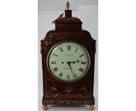 A Regency rosewood cut brass inlaid bracket clock, the caddy top with pine cone finial, flanked to the side by ring handles a