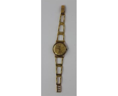 An Aureole gentleman's 18ct. gold bracelet watch,&nbsp;1960's, manual movement, having gold dial with gold baton hour markers