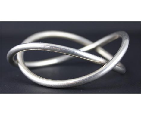 A Georg Jensen silver Alliance bangle,&nbsp;impressed "925", "G.J Ld" and import marks. (74.4g)