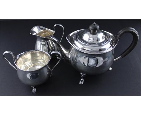 A three piece silver tea set, by Atkin Brothers, Sheffield 1916, comprising tea pot, milk jug and sugar, of circular form, th