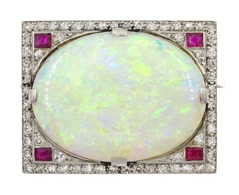 Art Deco platinum opal, diamond and ruby brooch, the cabochon oval opal surrounded by pave set diamonds and four rubies at ea