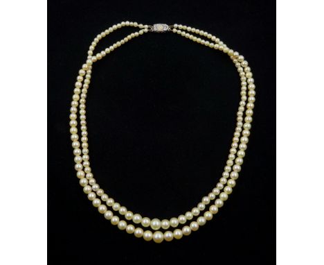 Double strand pearl necklace, graduating pearls between 3mm and 7.5mm, on 18ct white gold old cut diamond and opal milgrain s