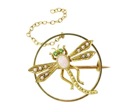 Edwardian gold dragonfly circular brooch, set with a cabochon opal, split seed pearls and peridots, stamped 15ct