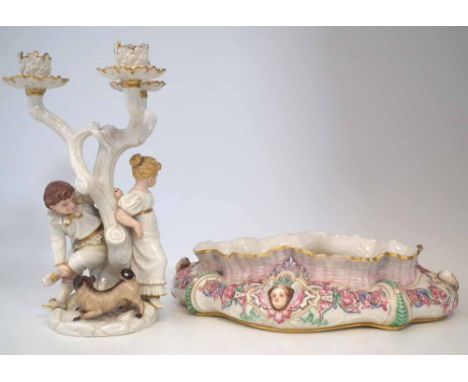 Royal Worcester candelabra, modelled with two children and pug dog, date code for 1881, also a Kerr and Binns, planter or bow