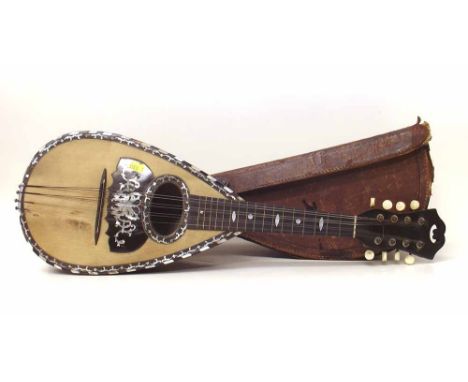 F. Ferrari and Son Neoplitan Bowl Back Mandolin with fluted multi rib back and pearl with case. Condition report: see terms a