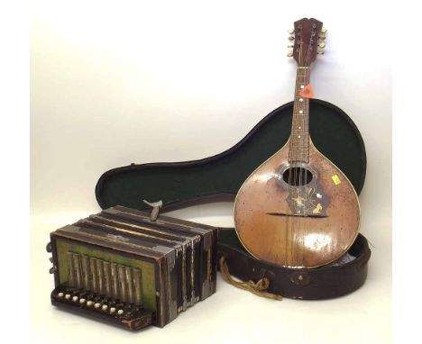 Flatback mandolin with case together with an accordion. Condition report: see terms and conditions.