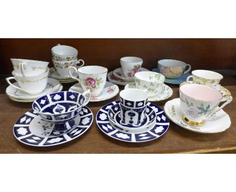 A collection of tea cups and saucers including Royal Crown Derby Unfinished pattern, Royal Worcester and Queen Anne 