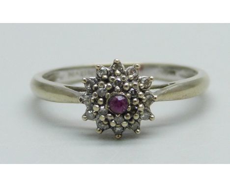 A 9ct gold, ruby and diamond cluster ring, 1.7g, P 