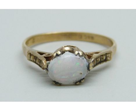 A 9ct gold and opal solitaire ring, 1.7g, M/N 