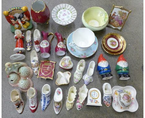 A box of decorative china and ornaments including a Carlton Ware Crinoline Lady cruet, Royal Worcester and shoe ornaments, et