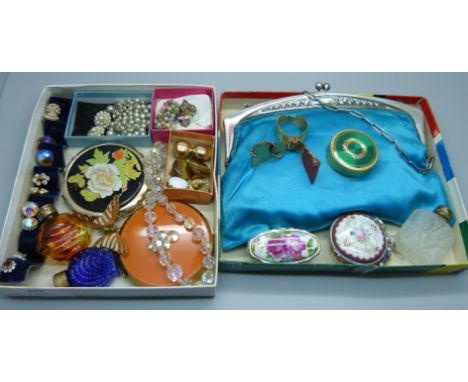 A collection of vintage compacts, a scent bottle, clip-on earrings and a bag 