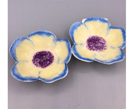 A pair of Clarice Cliff, Bizarre pin trays