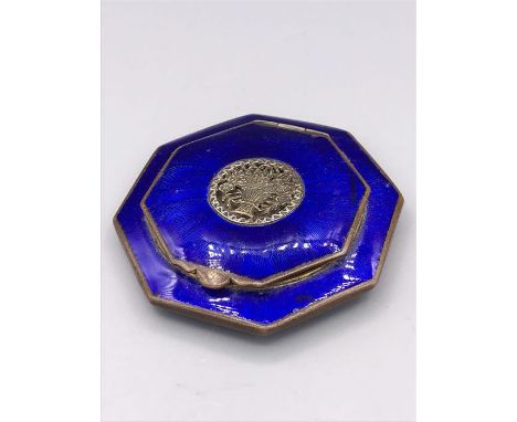 A blue compact with mirror 