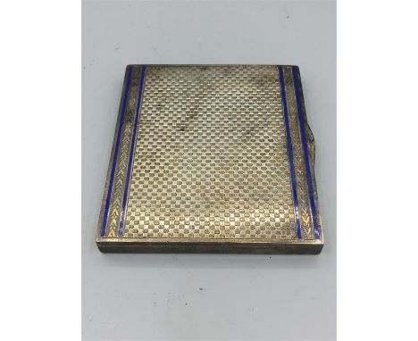 A silver cigarette case with blue enamel, hallmarked Birmingham 1905 (Import)