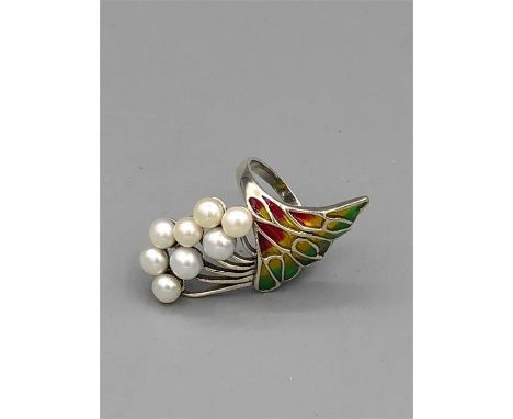 A silver Plique A Jour ring in the Art Nouveau style