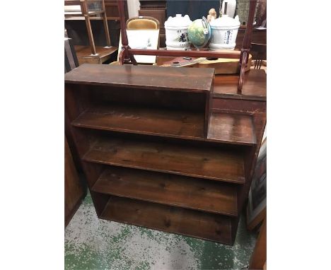 Vintage four shelf shelving unit made from packing cases.