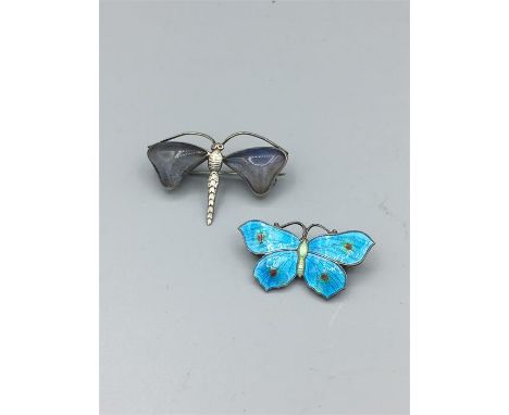 A silver & enamel butterfly brooch by John Atkins & sons, hallmarked Birminham 1917 and a sterling silver dragonfly brooch c.