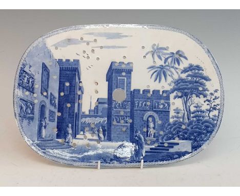 A circa 1810 Spode Caramanian series blue and white transfer decorated oval drainer, in the Castle of Boudron pattern, impres