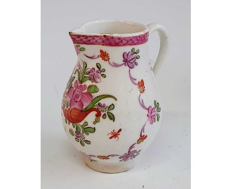A circa 1780 Lowestoft porcelain sparrowbeak jug, enamel decorated with floral sprays below a diaper border, h.9cm A very sma