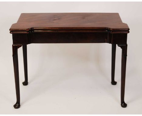 A George II mahogany card table, the foldover top with slightly dished corners for candles and opening to reveal baize lined 