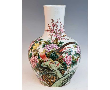 A 20th century Chinese porcelain tianqiuping vase, enamel decorated with a peahen amongst crysanthemums and prunus blossom, h