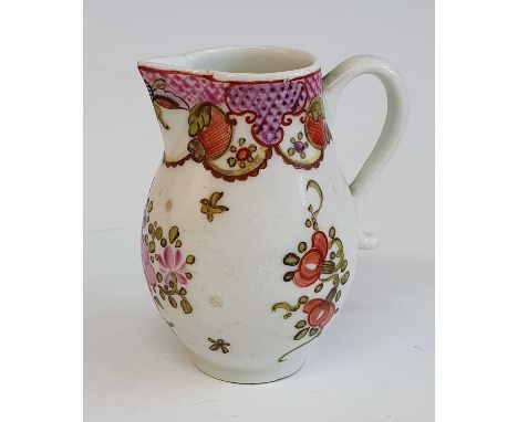A circa 1780 Lowestoft porcelain sparrowbeak jug, enamel decorated with floral sprays below a diaper border, h.9cm Some surfa