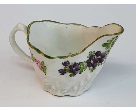 A circa 1780 Lowestoft porcelain 'Chelsea ewer' sauce boat, enamel decorated by 'The Tulip Painter', h.5cm Two small rim chip