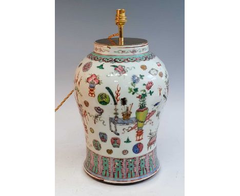 A 20th century Chinese Canton porcelain jar, of baluster form, enamel decorated in the hundred antiques pattern, converted in