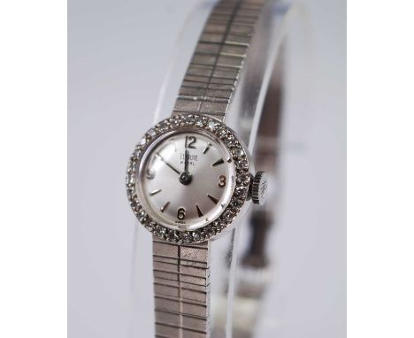 A lady's Tudor Royal 9ct gold bracelet watch, having a signed silvered dial with quarter Arabic numerals and baton markers, t