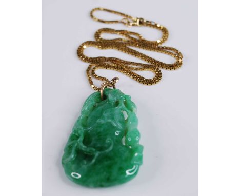 A Chinese carved green and celadon jade pendant, modelled as a gourd issuing leaves and foliage, h.54mm, approx 32g, on a mod